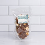 Stand-up pouch of Winfield's Milk Chocolate Popcorn