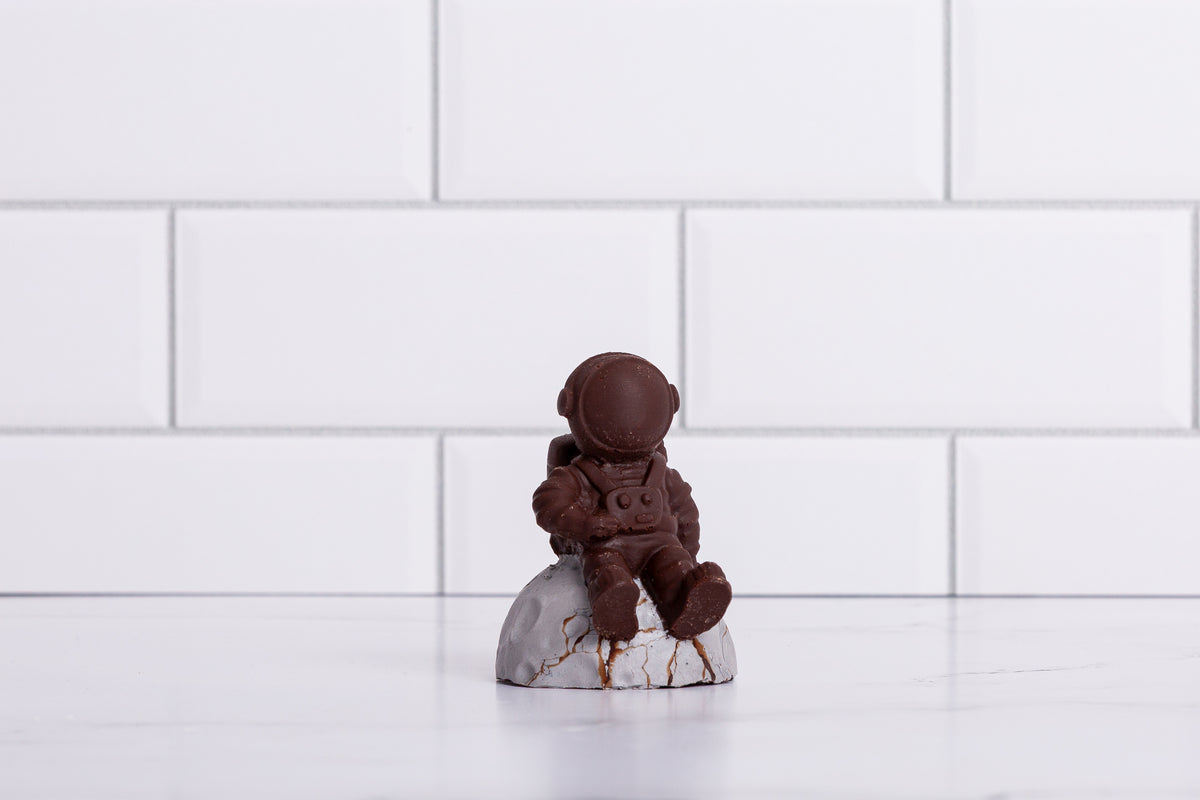 Winfield's molded chocolate astronaut on a moon-rock base, close view
