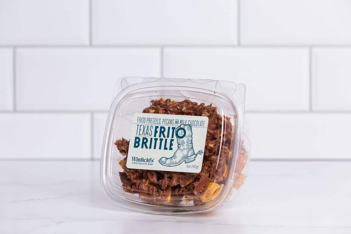 Small clear tub of Winfield's Texas Frito Brittle