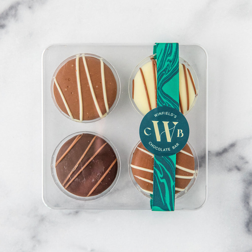 Winfield's Chocolate Covered Oreos 4-piece tray banded with the teal Winfield's wrap