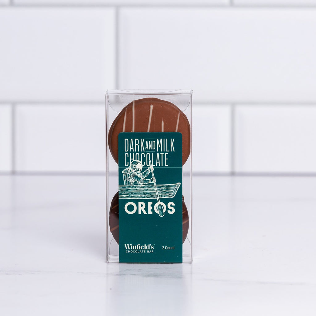 Winfield's Chocolate Covered Oreos 2-count box in dark and milk chocolate, shown through the clear window