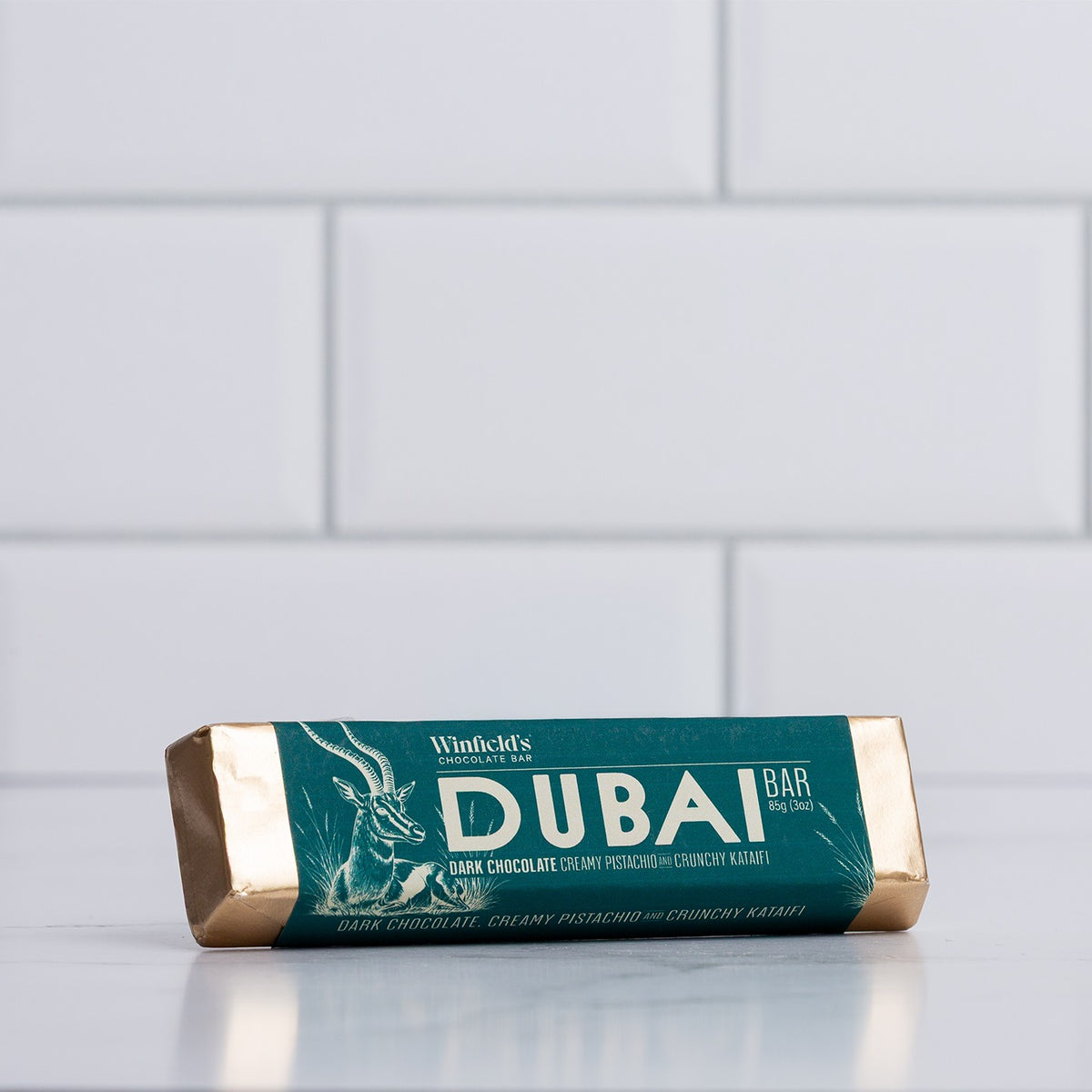 Winfield's Dark Chocolate Dubai Bar in its teal wrapper