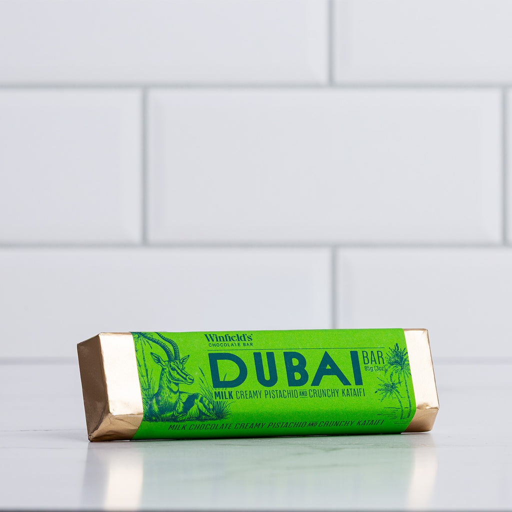 Winfield's Milk Chocolate Dubai Bar in its green wrapper