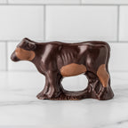 Winfield's dark chocolate cow with milk chocolate markings, side view