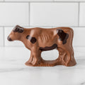 Winfield's milk chocolate cow with dark chocolate markings, side view